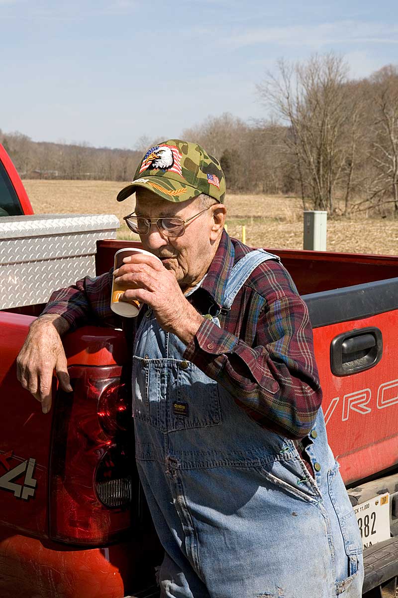 Gordon Gilliland getting a drink from the Gilliland spring, English IN