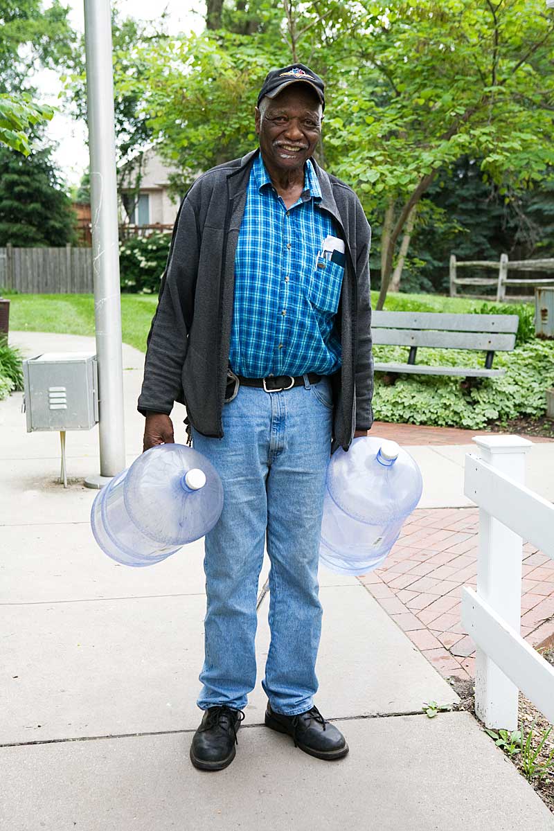 Man with 2 water bottles, Flowing Well Park, Carmel IN